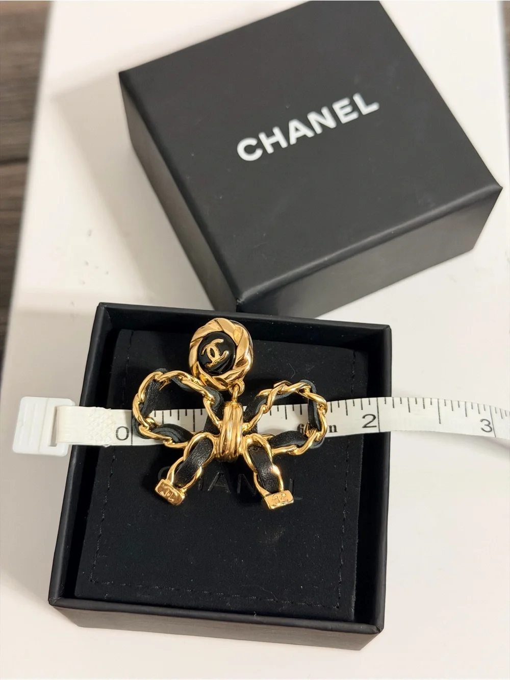CHANEL Leather Bow CC Gold Dangle Earrings